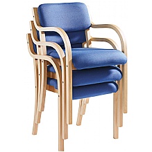 Stack of wooden frame meetimh chairs stored away
