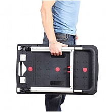 Foldaway platform trolley being carried